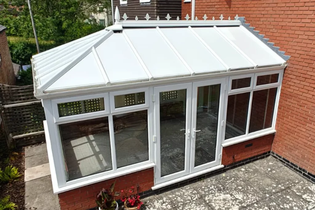 Completed conservatory roof insulation by insulated conservatory roof panels