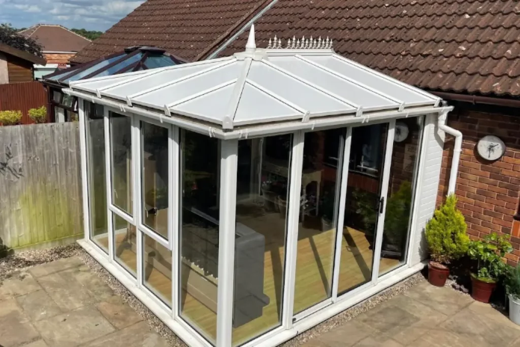 Completed conservatory roof insulation by insulated conservatory roof panels