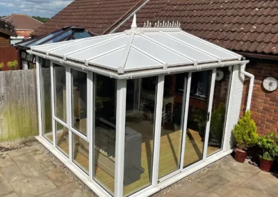 Completed conservatory roof insulation by insulated conservatory roof panels