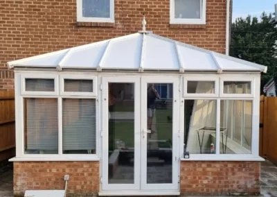 Completed conservatory roof insulation by insulated conservatory roof panels